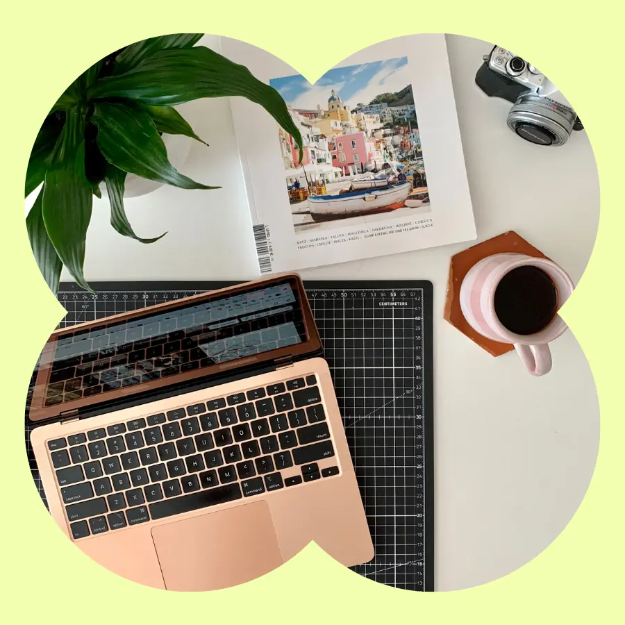 Showing a desk with a laptop and coffee